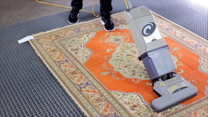 Pro-Care vacuums rugs before rug cleaning - area rug cleaning, oriental rug cleaning and all custom rugs.