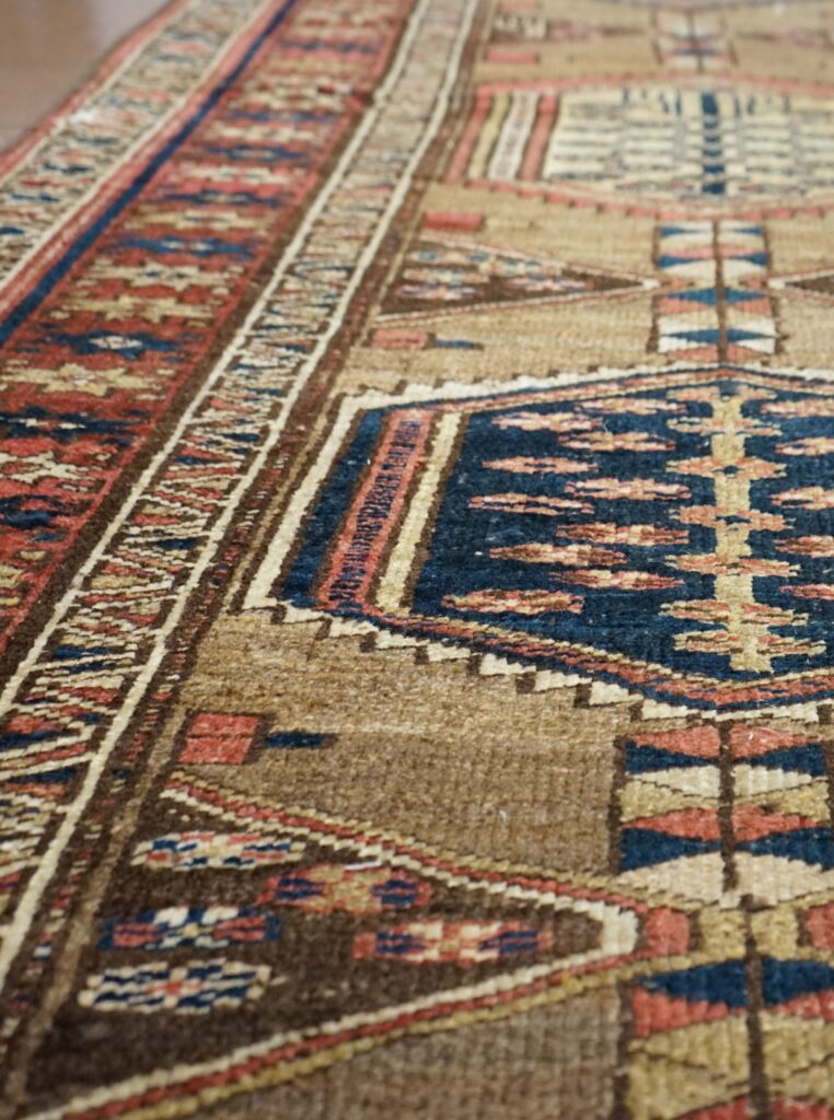 Traditional and imported rugs are highly prized for their handknotted craftsmanship.