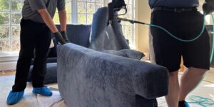 Pro-Care Technicians partner to protect sofa.