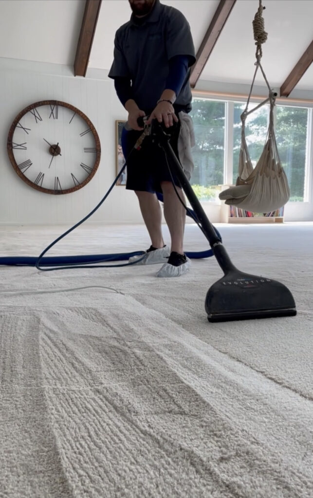 Pro-Care Tech cleans white carpet in family room