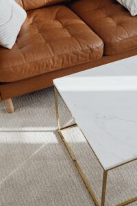 Designer living room features light carpet