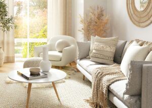 White designer living room with featured textiles.