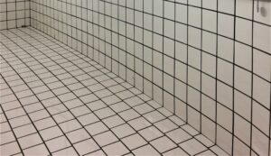 Closeup of a tile hallway.