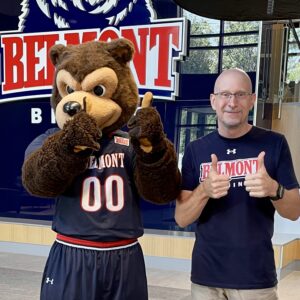 President John Browning poses with Belmont's Mascot, Bruiser, to celebrate Pro-Care's corporate sponsorship of the Belmont Bruin Athletic Department.