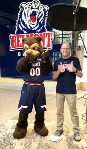 President John Browning poses with Belmont's Mascot, Bruiser, to celebrate Pro-Care's corporate sponsorship of the Belmont Bruin Athletic Department.