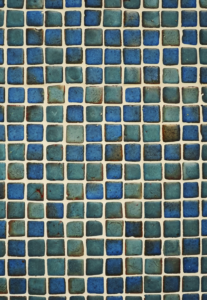 Handmade tile like this blue-green Zellige has beautiful imperfections and color variations.