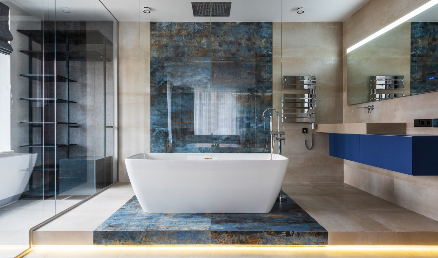A wrapped installation is one of the newest trends in tile and makes for a stunning focal point in a contemporary bathroom.